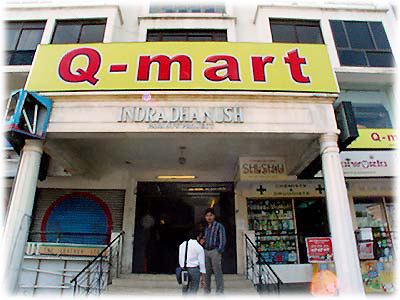 Q-mart̊O